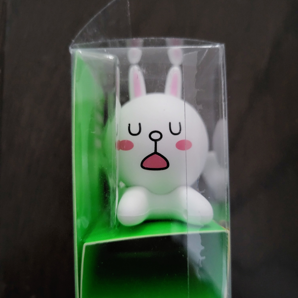 White and Pink Bunny Figurine Phone Holder